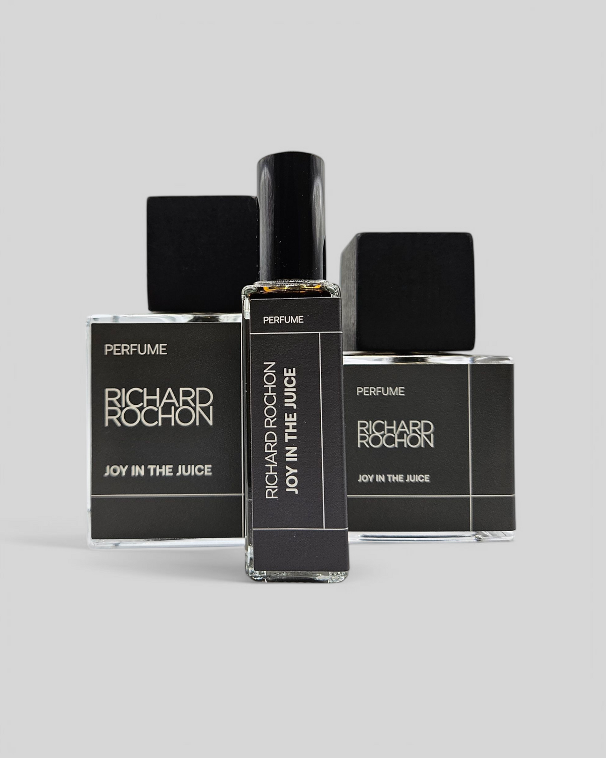 Richard Rochon Joy in the Juice perfume – oak, moss, and mineral fragrance with amber and juniper notes, available in 20 mL, 50 mL, and 100 mL bottles
